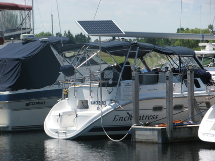130 watt rigid marine solar panel mounted with top of pole system on Hunter 41 foot sailboat