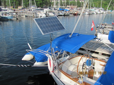 90 Watt rigid Marine Panel on Aloha 32 sailboat using top of pole solar panel mounting system