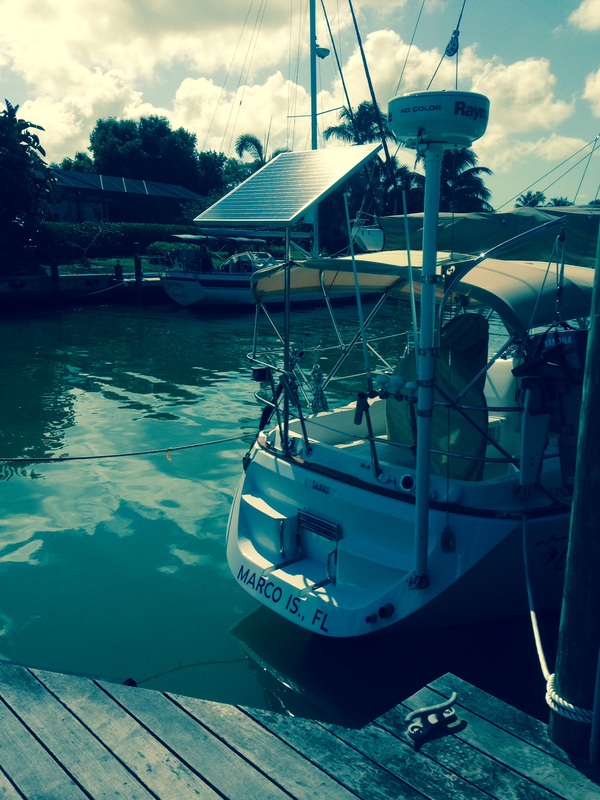 140 Watt Marine Solar Panel w/ Bimini Attachment and top of pole solar panel mounting system on sailboat