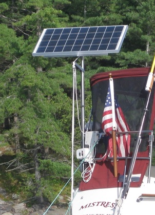 marine solar setup on sailboat with top of pole mounting system