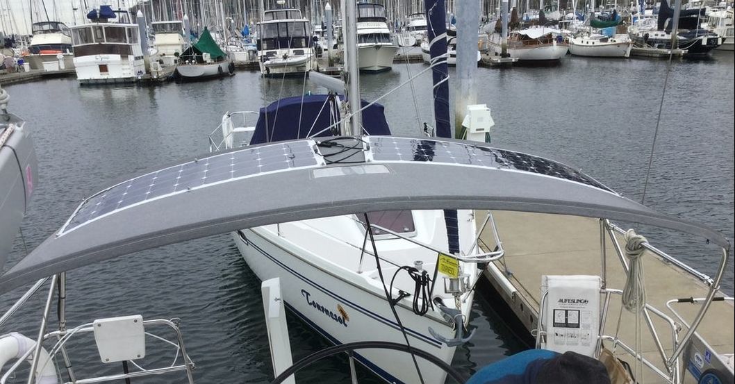Two 110 watt semi-flexible marine solar panels with SunPower cells - Beneteau 50 sailboat on bimini with mount kit