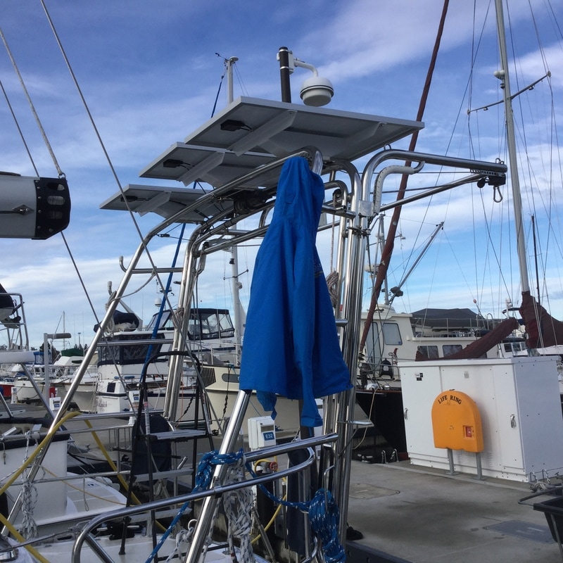 three 120 Watt Rigid Marine Solar Panels on a Hylas 49 boat