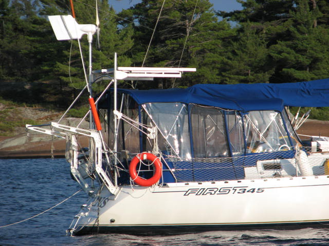 cantilevered solar panel mount on sailboat
