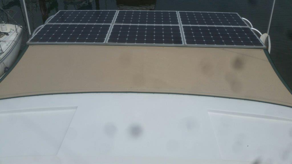 six 120 watt SunPower cell solar panels powered by 2 Tracer BN controllers on a boat