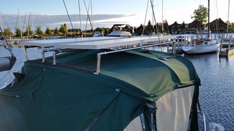3 rigid marine solar panels mounted on boat
