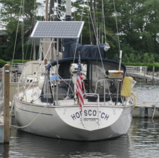 130 watt solar panel mounted top of pole on sailboat