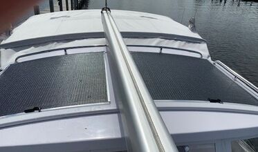 walk on marine solar panels mounted on roof of sailboat