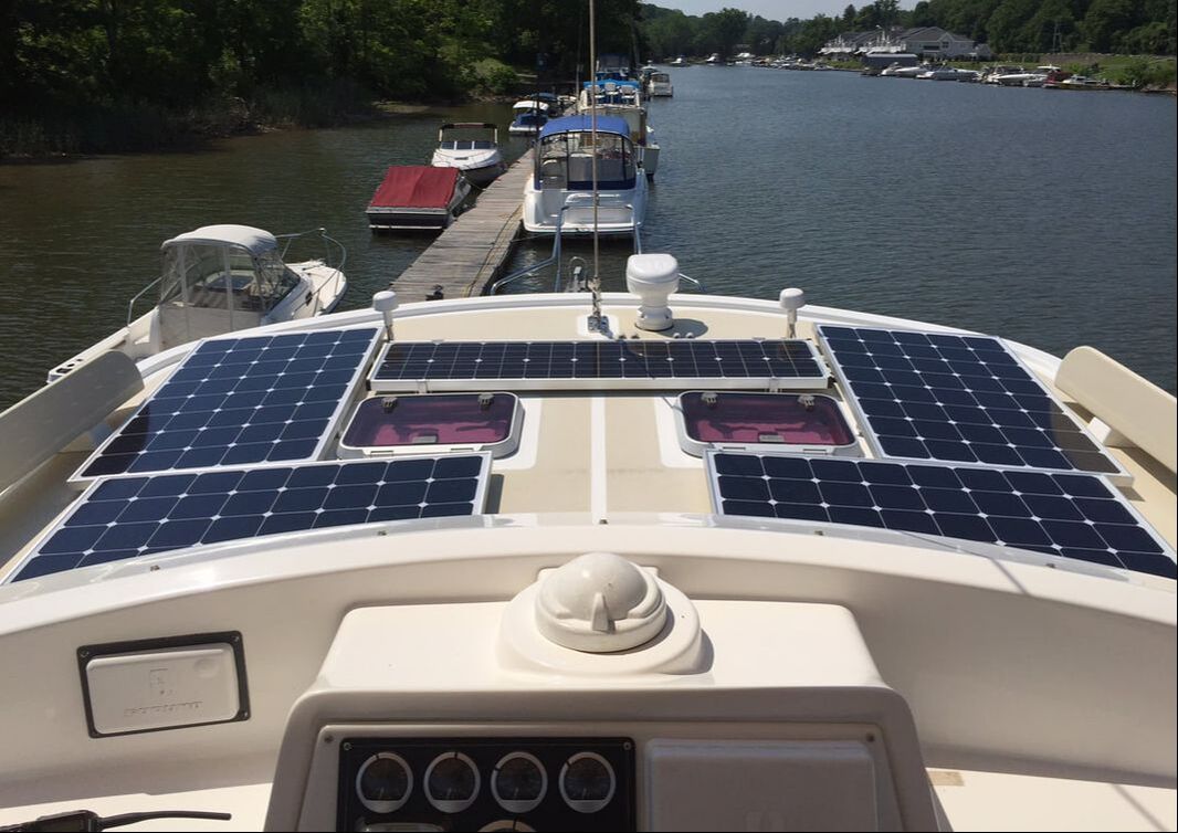 Rigid marine solar panel on boat