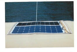 2 flexible marine solar panels mounted on sailboat bimini