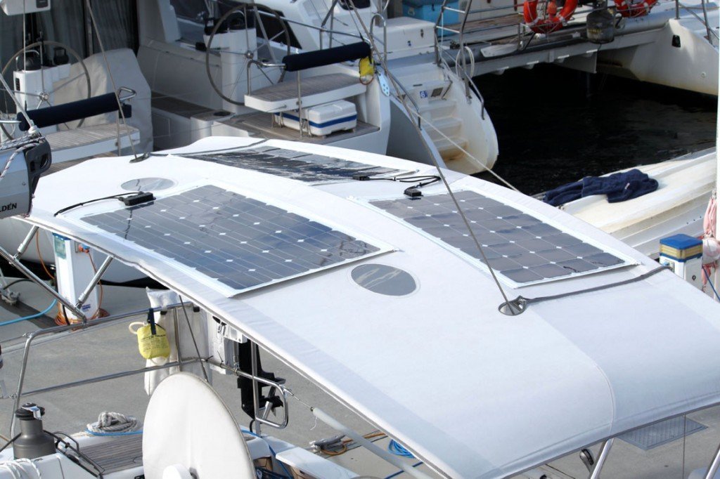 Flexible marine solar panels mounted on sailboat bimini