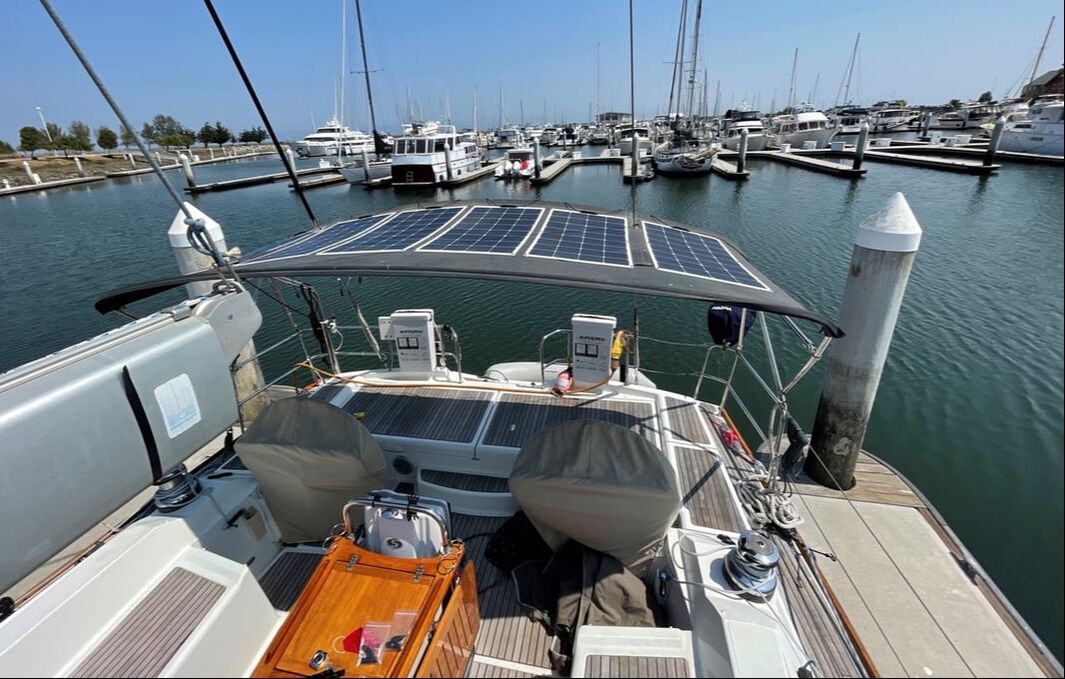 Two 110 watt semi-flexible marine solar panels with SunPower cells - Beneteau 50 sailboat Attached with Bolt-on mount Kit