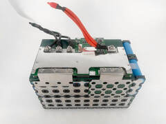 lifepo4 marine battery with top opened showing cell and BMS electronics