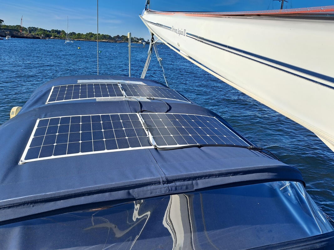 2 110 watt flexible marine solar panels with bolt-on solar panel mounting kit to bimini canvas on boat